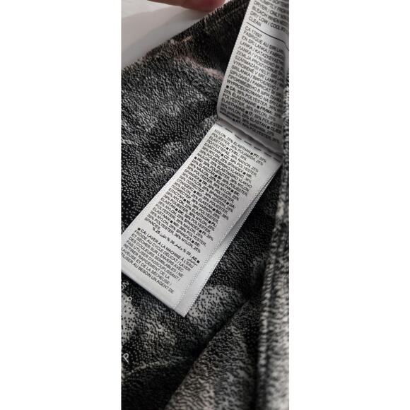 Athleta Elation Textured Tight in Chakra Floral Black Sea Salt, Size S Petite - Picture 6 of 7